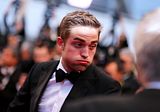 photo NEWHQPicsOfRobertPattinsonOnTheCosmoCannesRedCarpet15.jpg